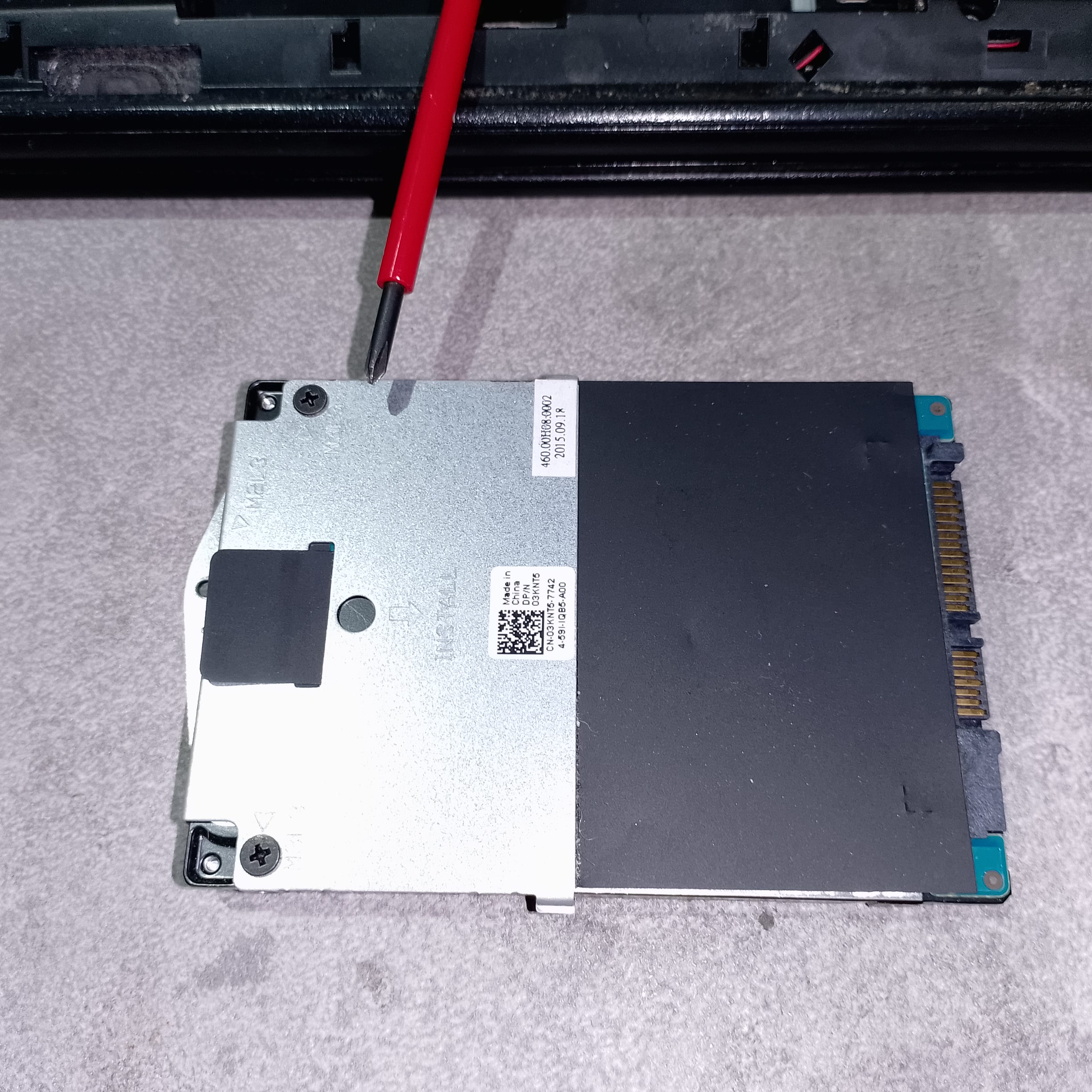 Снятый HDD с креплением из ноутбука Dell P40F